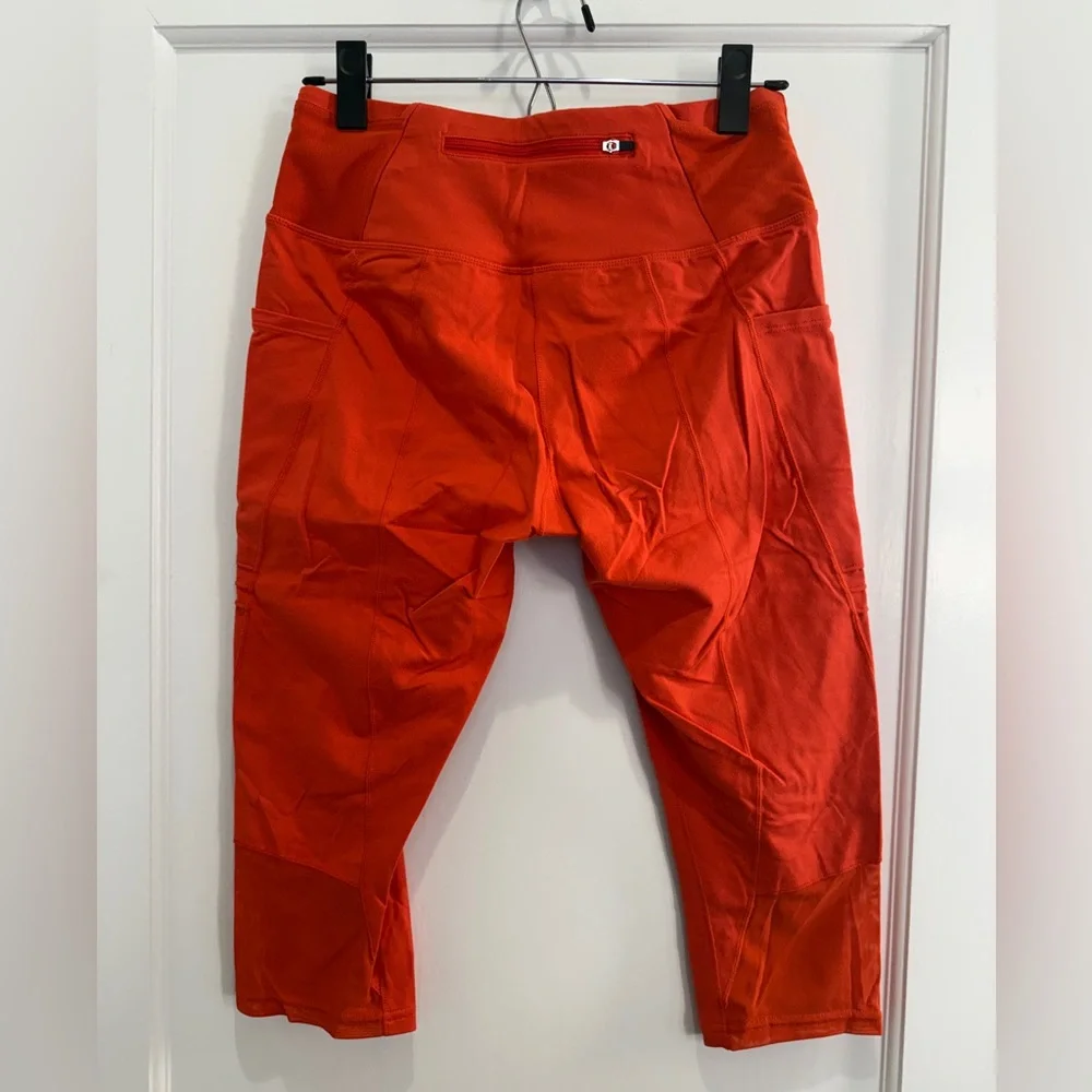 oiselle Pocket Jogger Knickers, orange - Picture 2 of 3